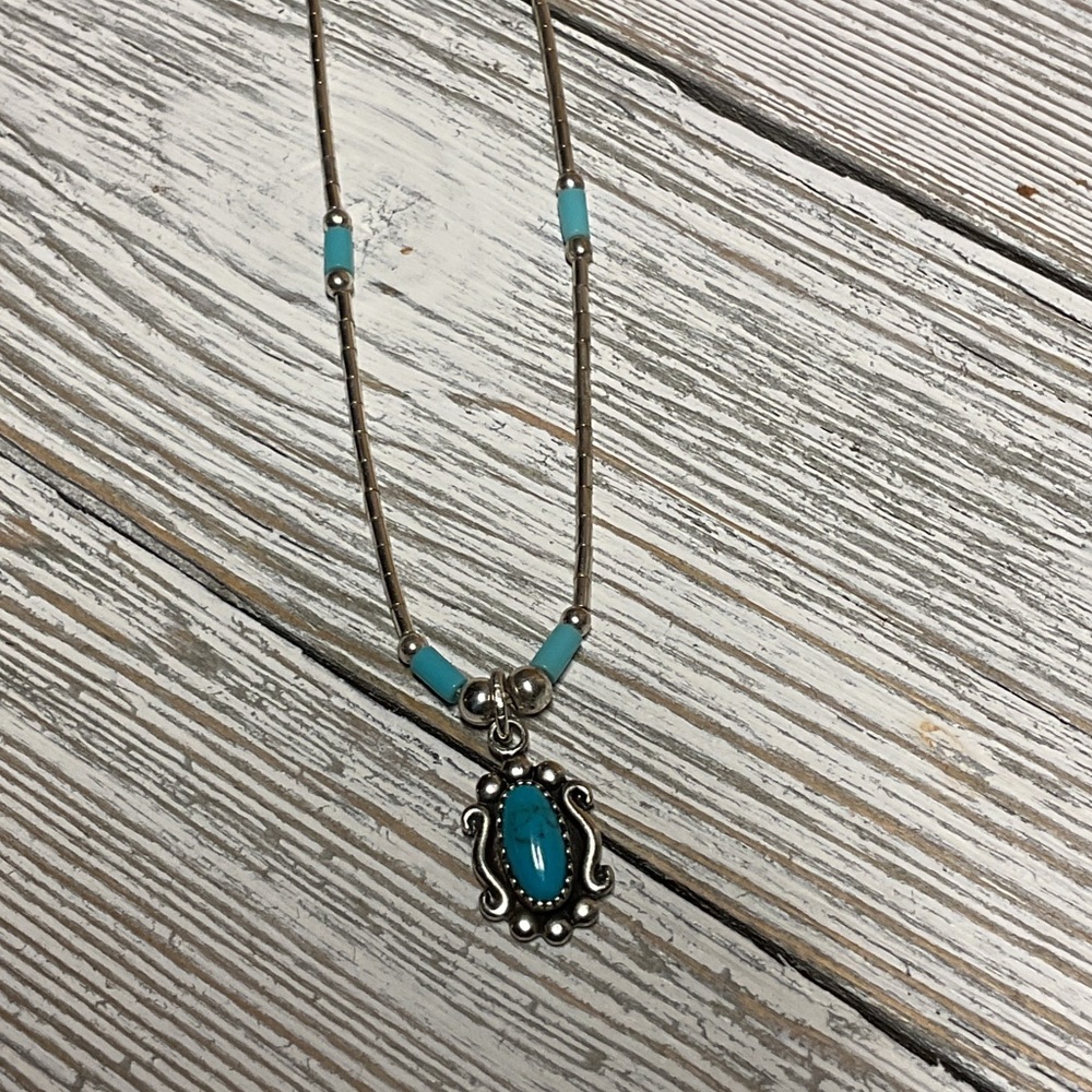 Vintage sleeping beauty turquoise liquid silver necklace Navajo sterling signed